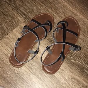 Faux leather sandals.